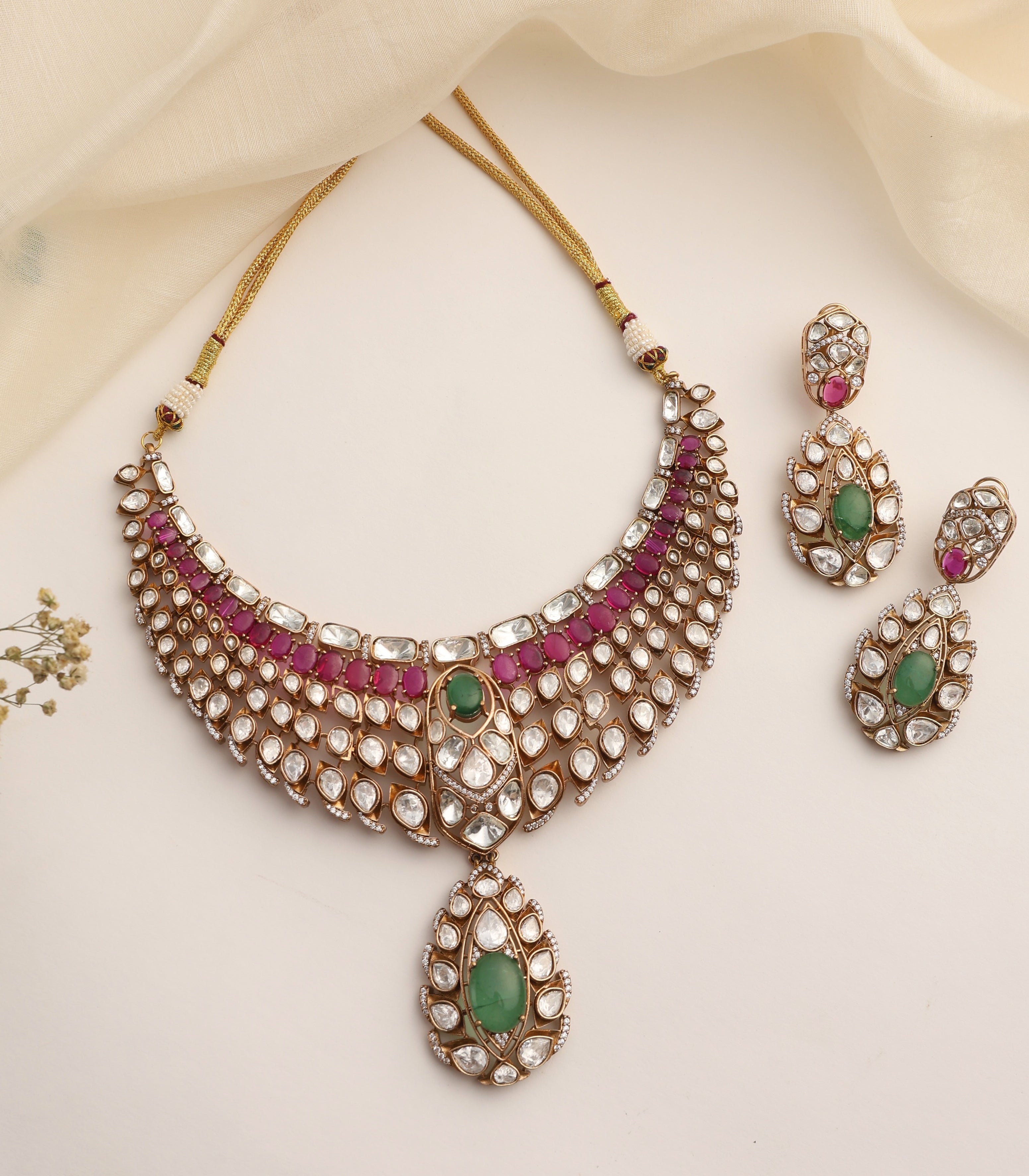 Regal Heritage Kundan Necklace Set with Emerald Green & Ruby Accents