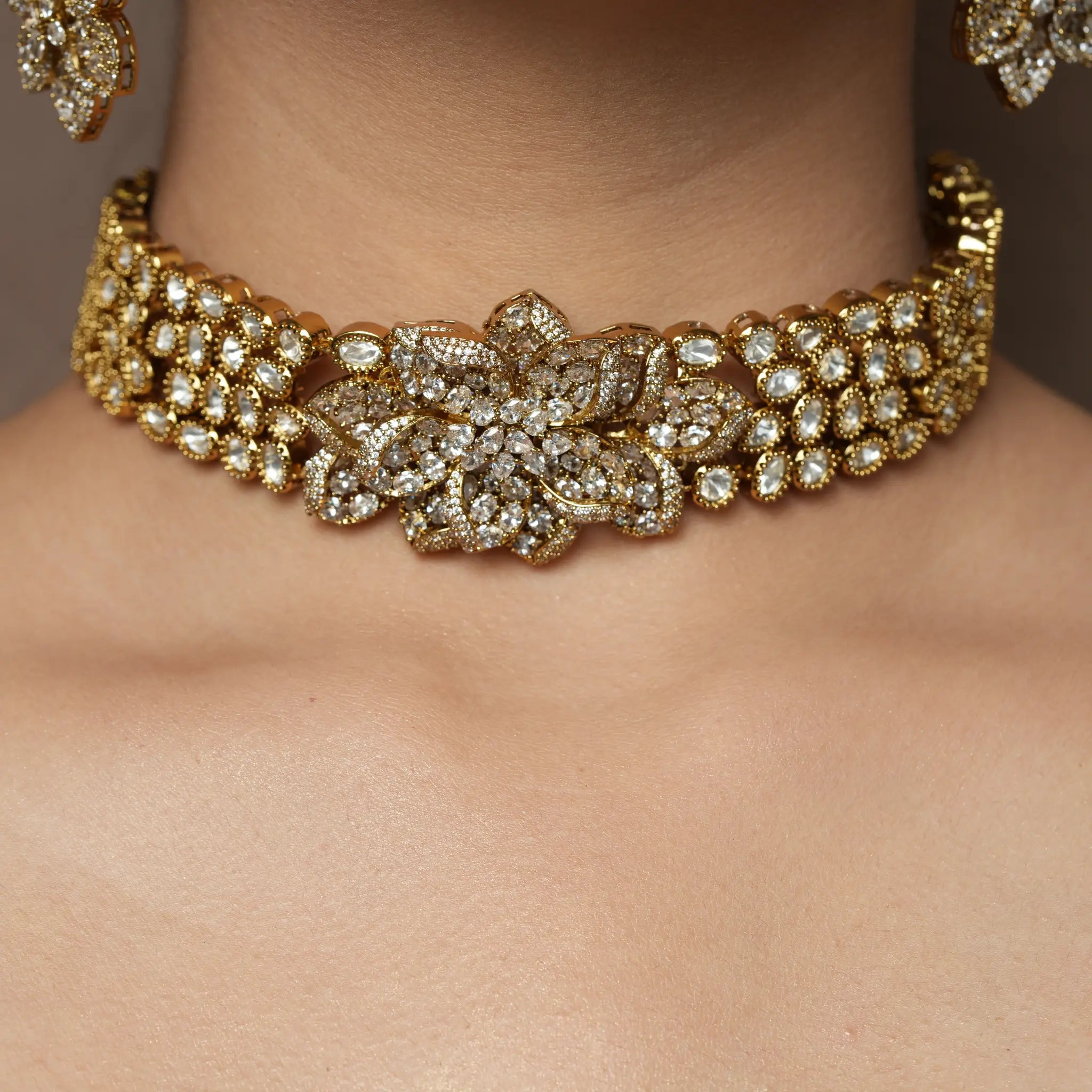 Aaraya Gold Floral Polki Choker Necklace & Earrings Set