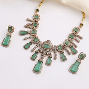 Kundan-inspired statement necklace with CZ accents and green stones