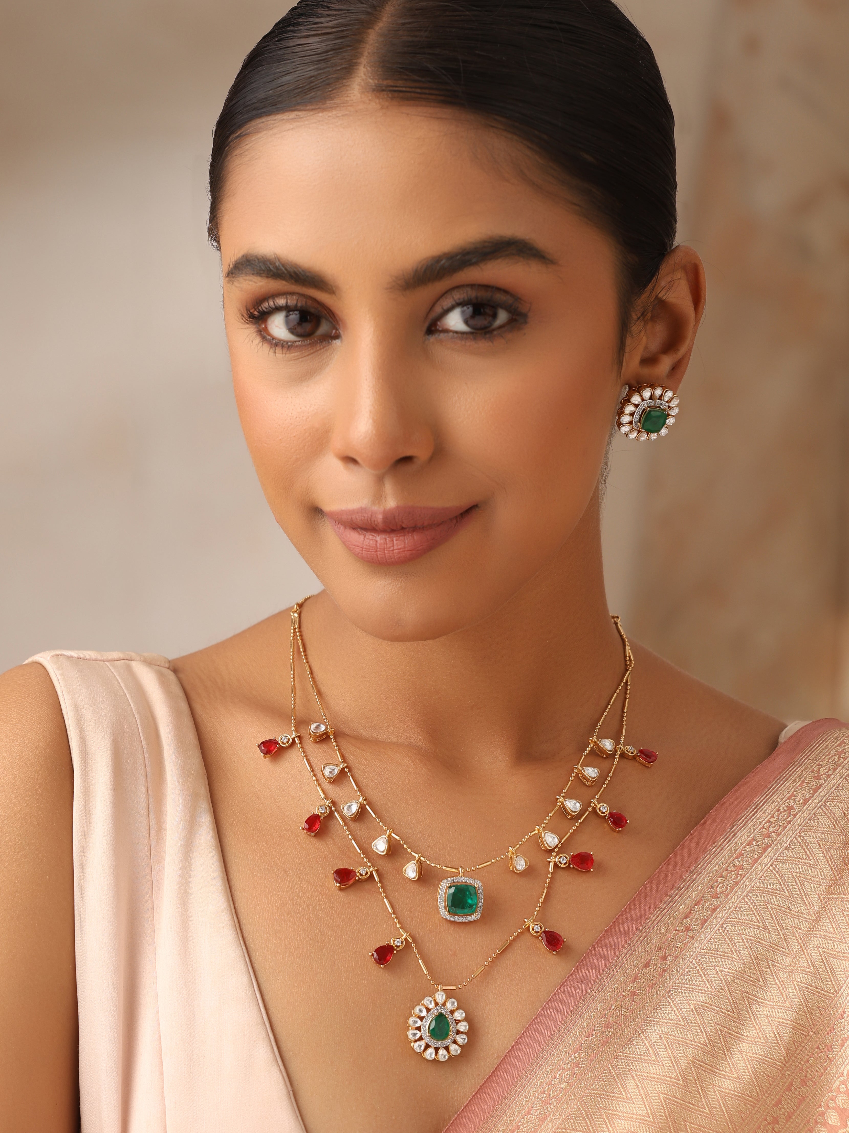 Model wearing Emerald & Ruby Layered Kundan Necklace with Matching Earrings – Gold Plated