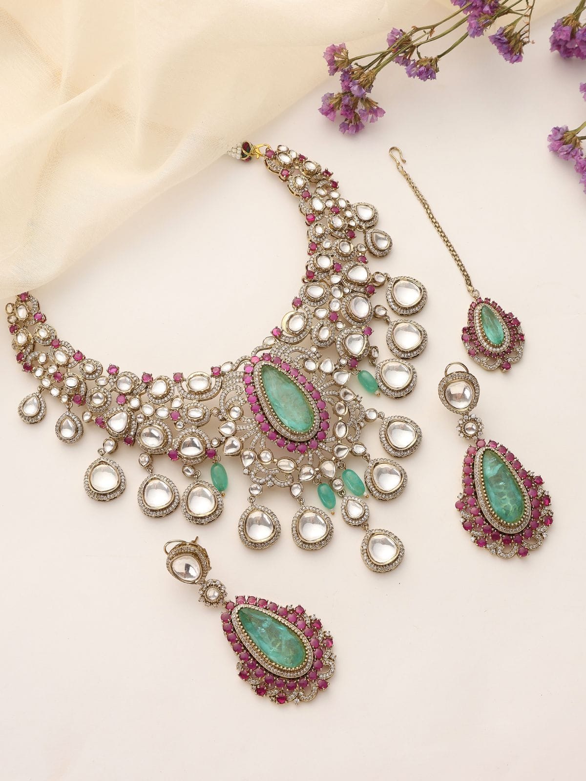 Ameira Kundan Polki Necklace Set with Green & Ruby Accents (with Earrings & Maang Tikka)