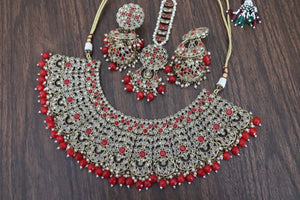 Red Antique Gold Polki Choker with Jhumka and tikka