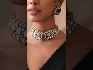 Close-up of the royal emerald Kundan choker worn, showcasing its bold heritage design.
