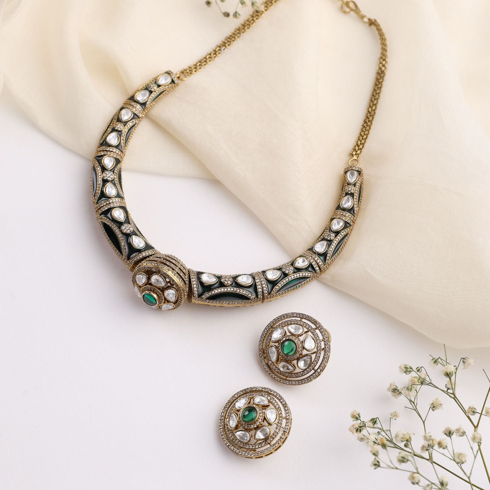 Rudra Green Kundan Hasli Set in Antique Finish with Earrings