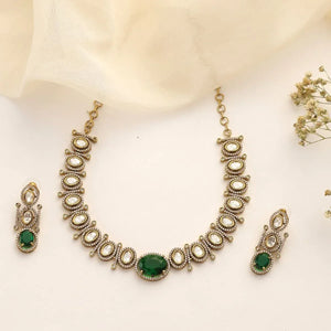 Uncut Polki Emerald Necklace Set with Antique Finish & Matching Earrings