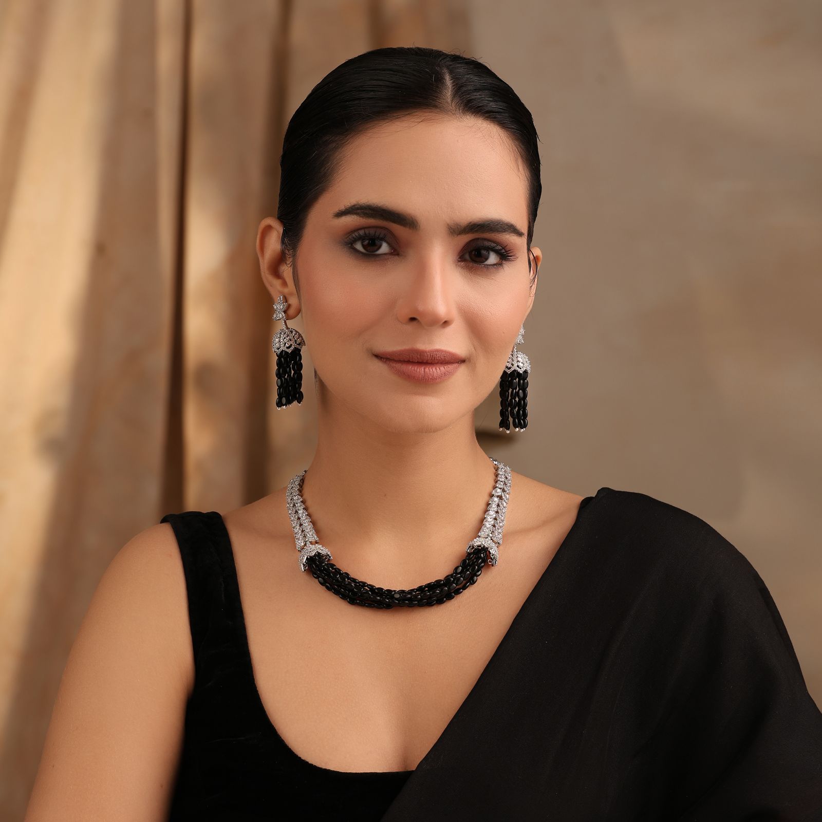 Noir Elegance Black Beaded Necklace with Tassel Earrings – Side Profile