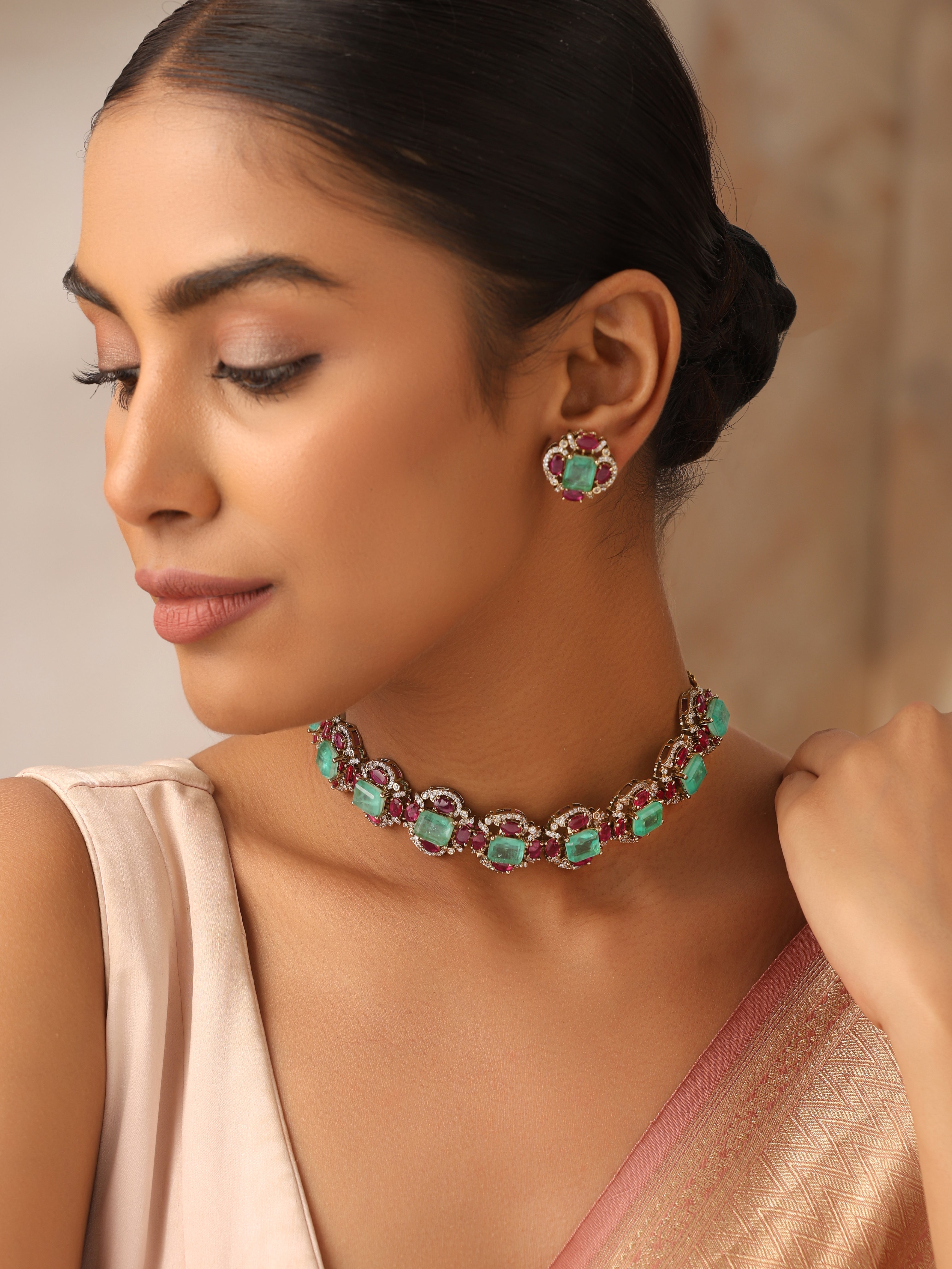 "Emerald Paraiba choker necklace with ruby accents worn with saree – handcrafted Kundan bridal jewelry"