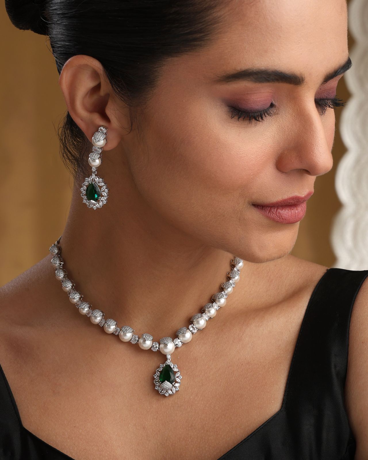 Pearl necklace with emerald-green pendant and CZ accents