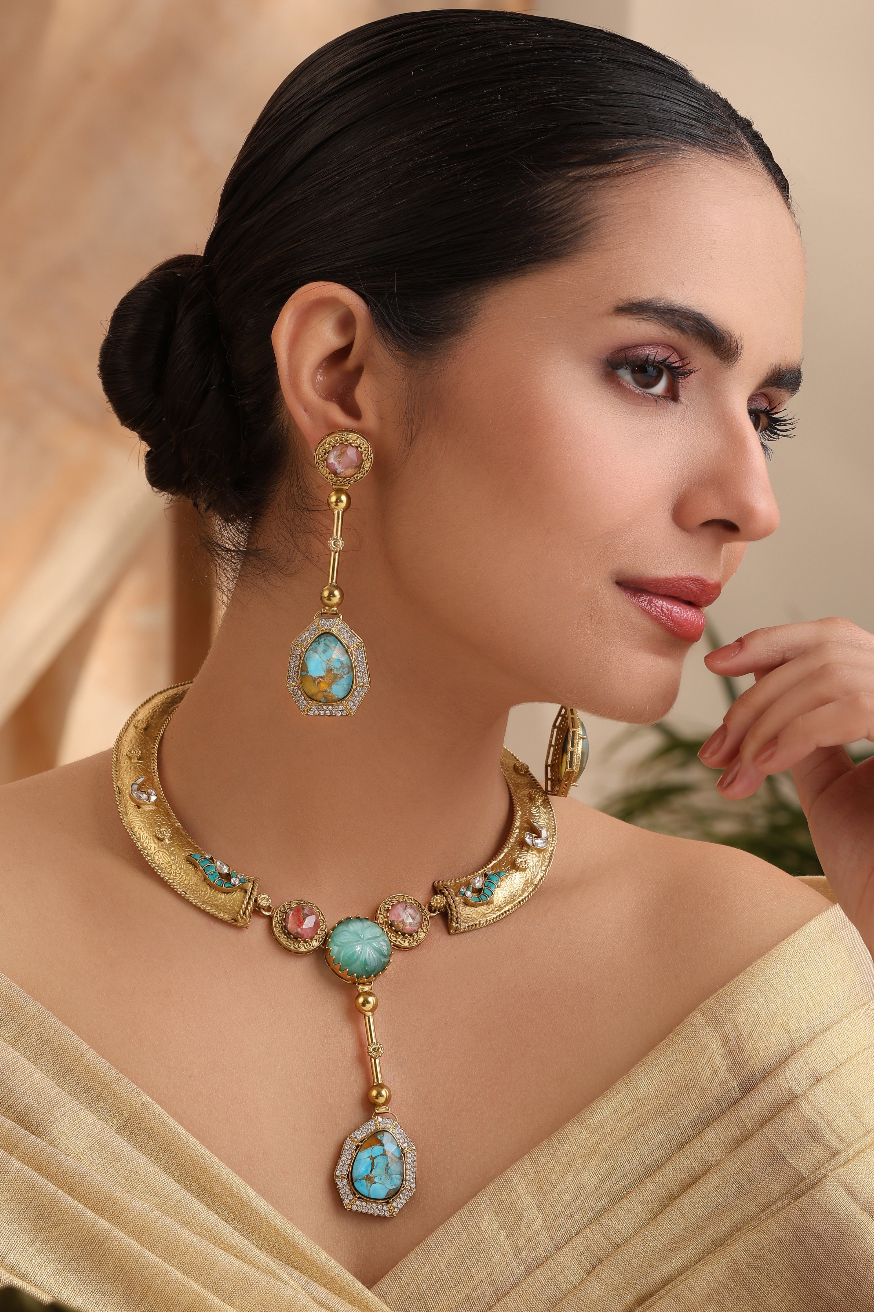 Model wearing Aurelia Turquoise Gold Collar Set with carved stone pendant, turquoise accents, and matching drop earrings – MyRivaaz.