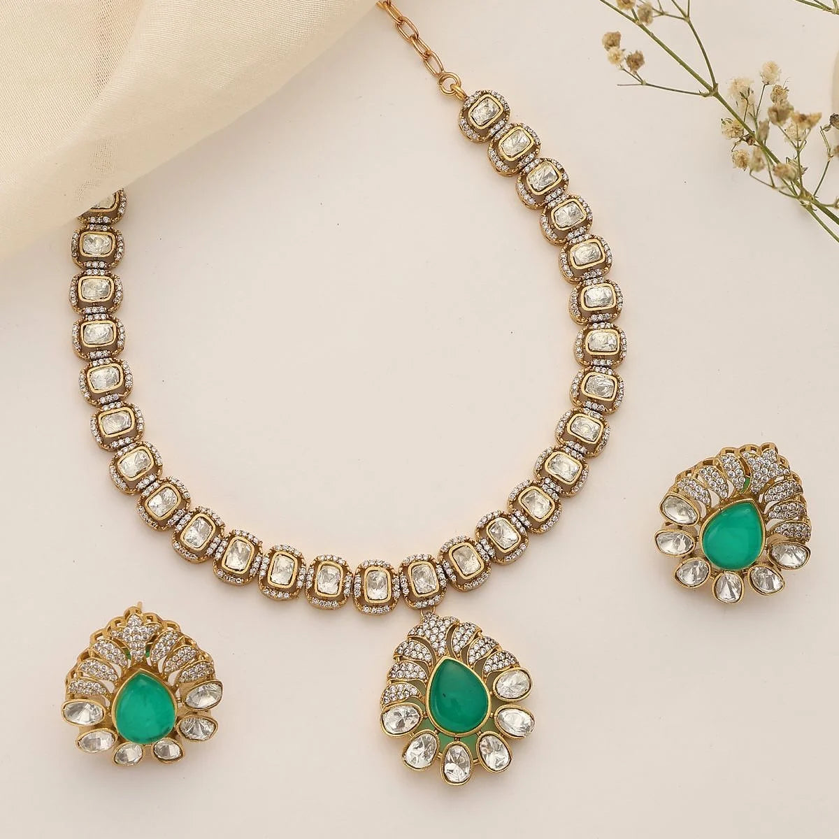 Model wearing Aabroo Emerald Polki Choker Set – Front View
