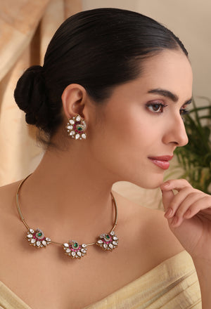 Close-up of Anaya Blossom Masonite Hasli Set – three-blossom choker with masonite, emerald & ruby stones, matching stud earring.