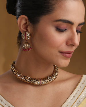 Model wearing Amara Antique Gold Collar Set with ruby accents