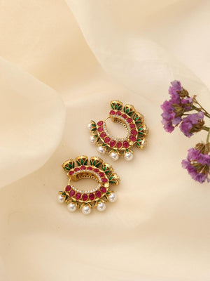 Kundan hoop earrings featuring red stones, CZ sparkle, and pearl drops.