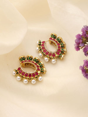 Kundan hoop earrings featuring red stones, CZ sparkle, and pearl drops.