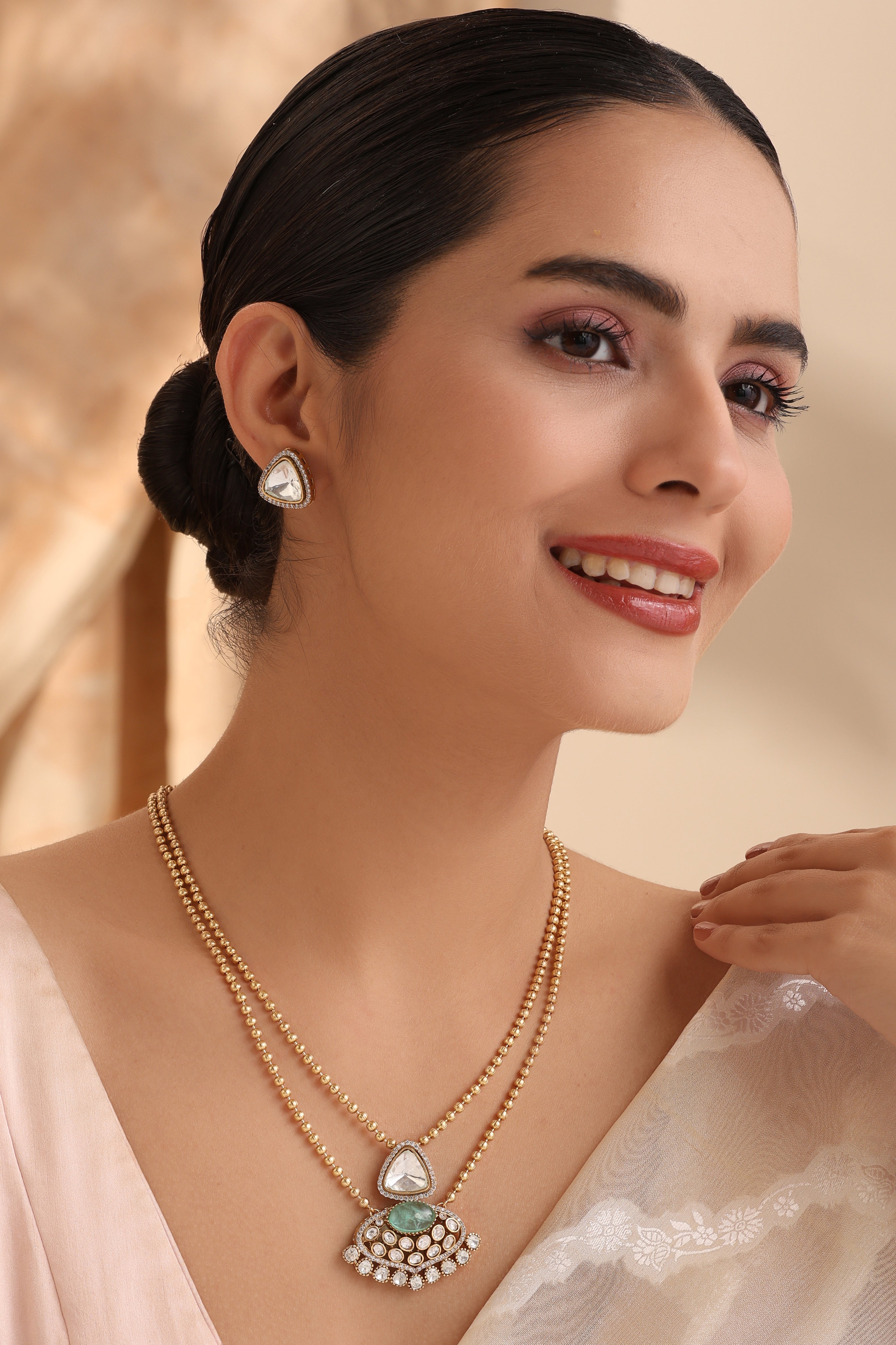 Model wearing Ishani Kundan & Moissanite Pendant Set with double-layer chain