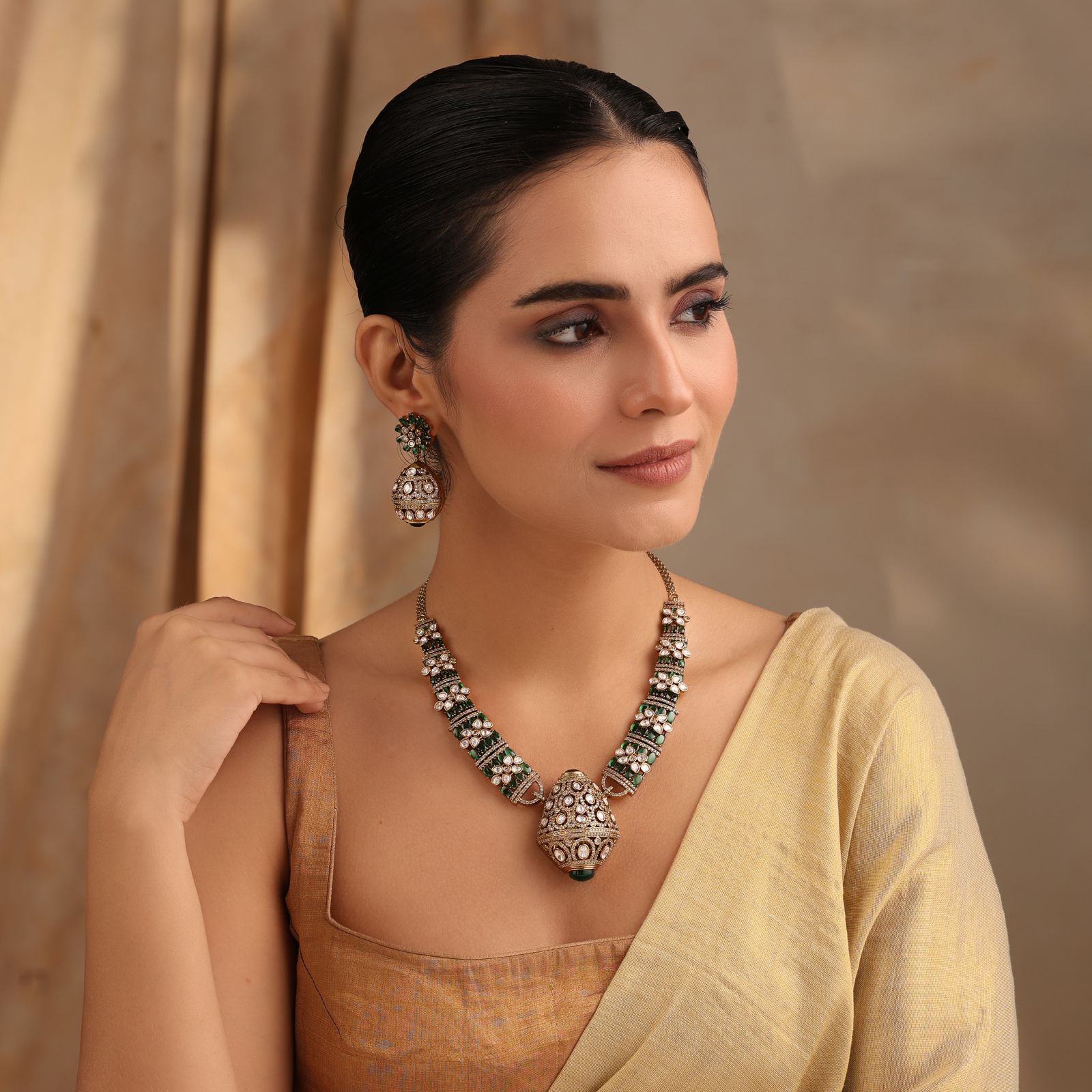Rajvansh Emerald Polki Necklace with Jhumka Earrings (Antique Gold Finish)
