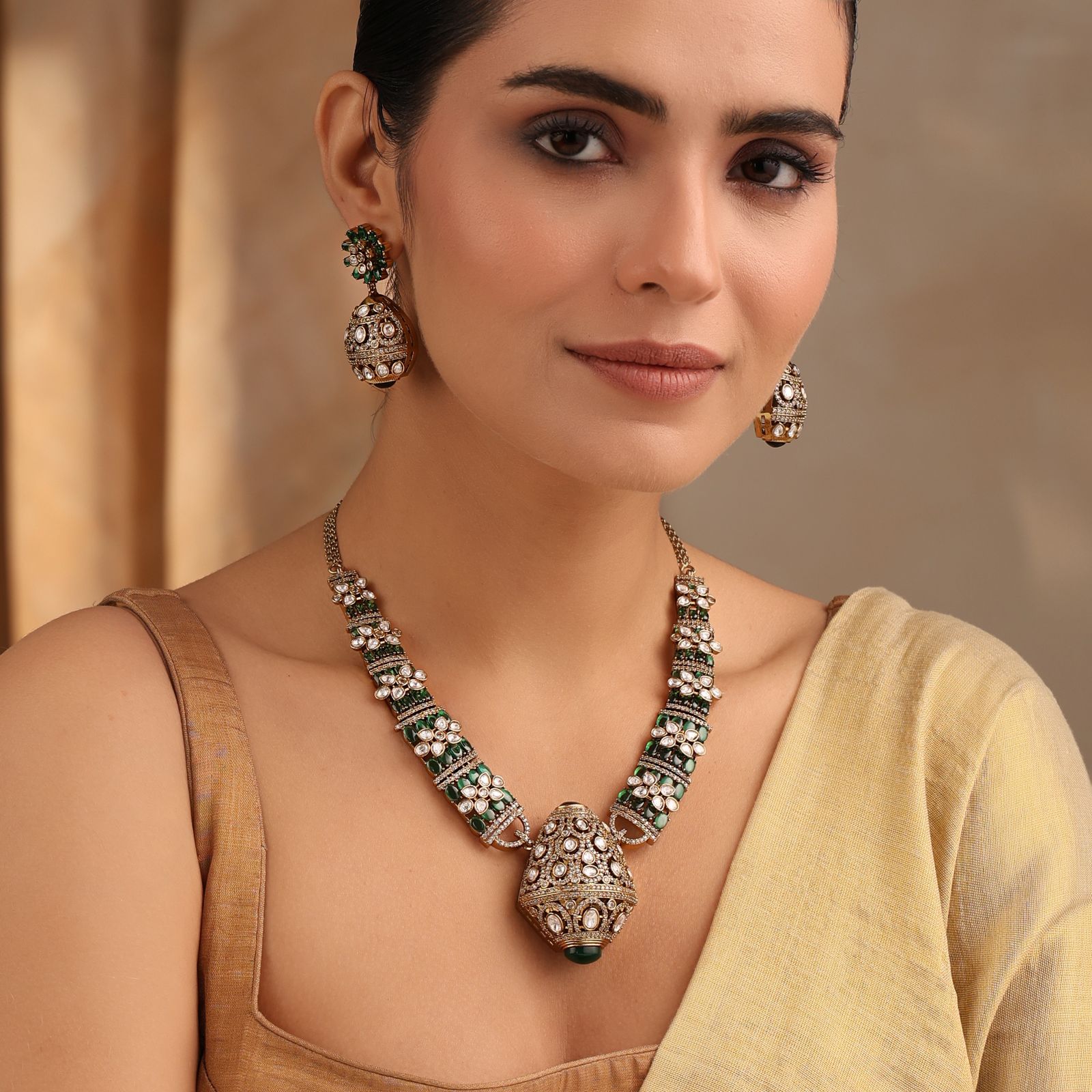 Rajvansh Emerald Polki Necklace with Jhumka Earrings (Antique Gold Finish)