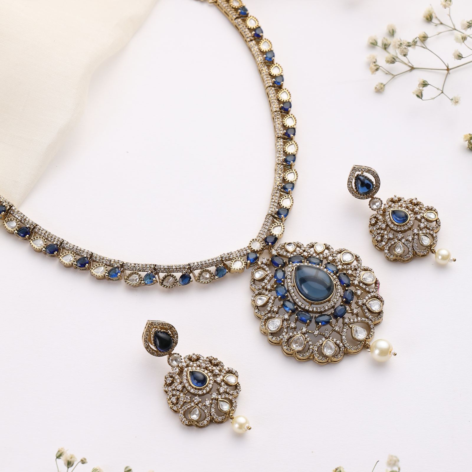 Nivara Blue Polki Kundan Necklace Set (With Earrings)