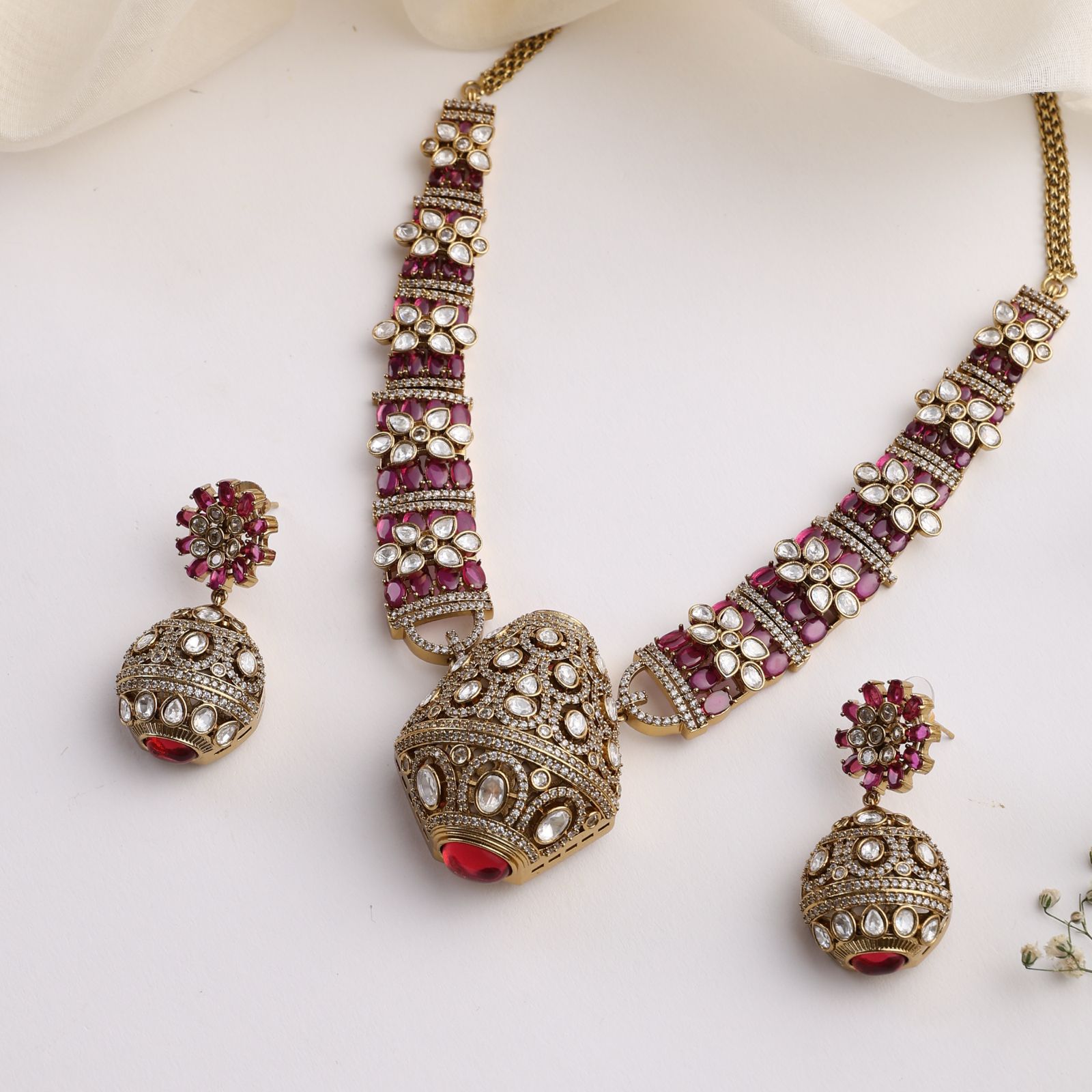 Rajvansh Ruby Polki Necklace with Jhumka Earrings (Antique Gold Finish)