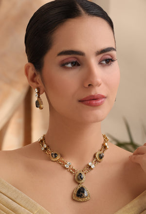 Aarini Black Stone Kundan Necklace Set | Antique Gold Finish with Earrings