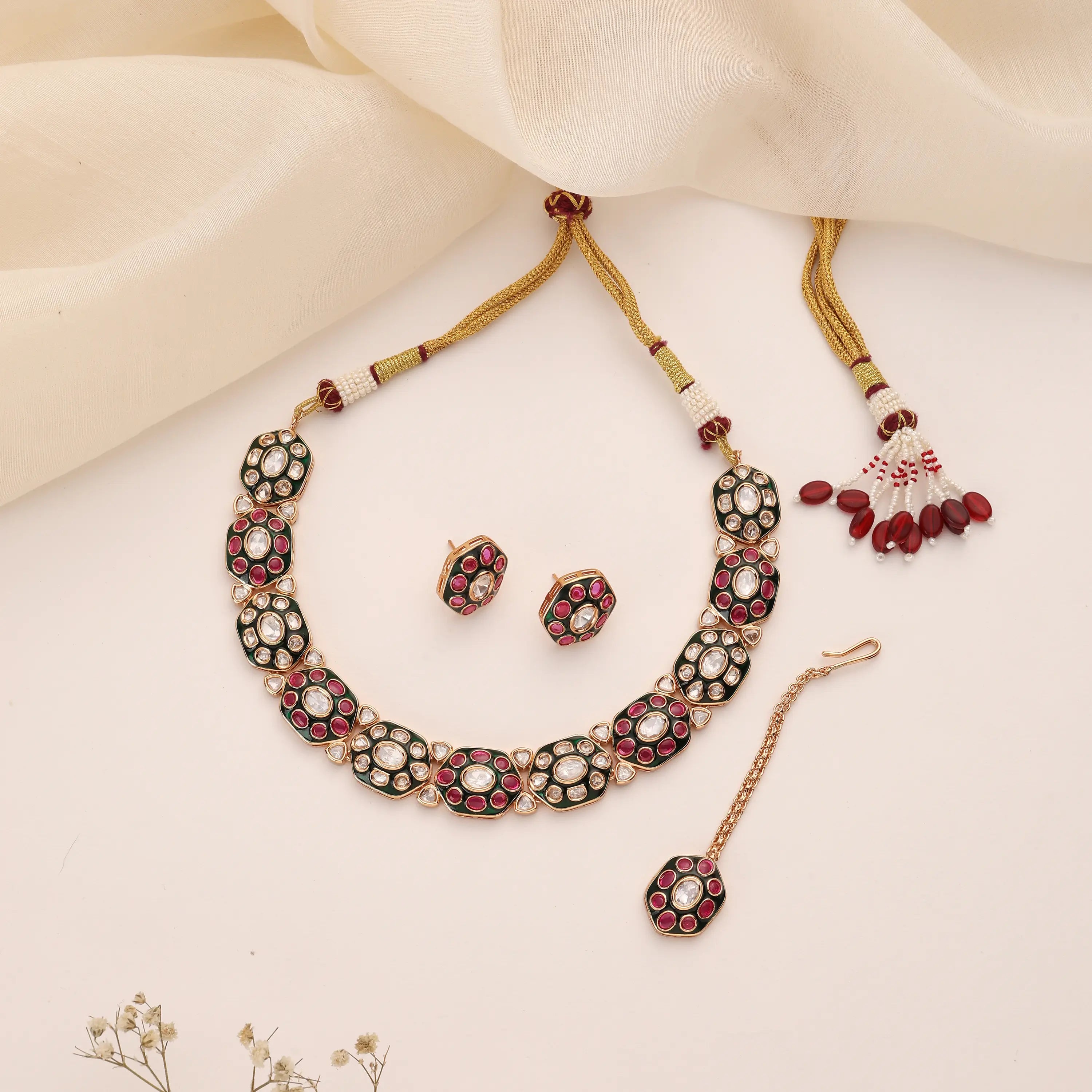 Avya Kundan Choker Set with Earrings & Maang Tikka