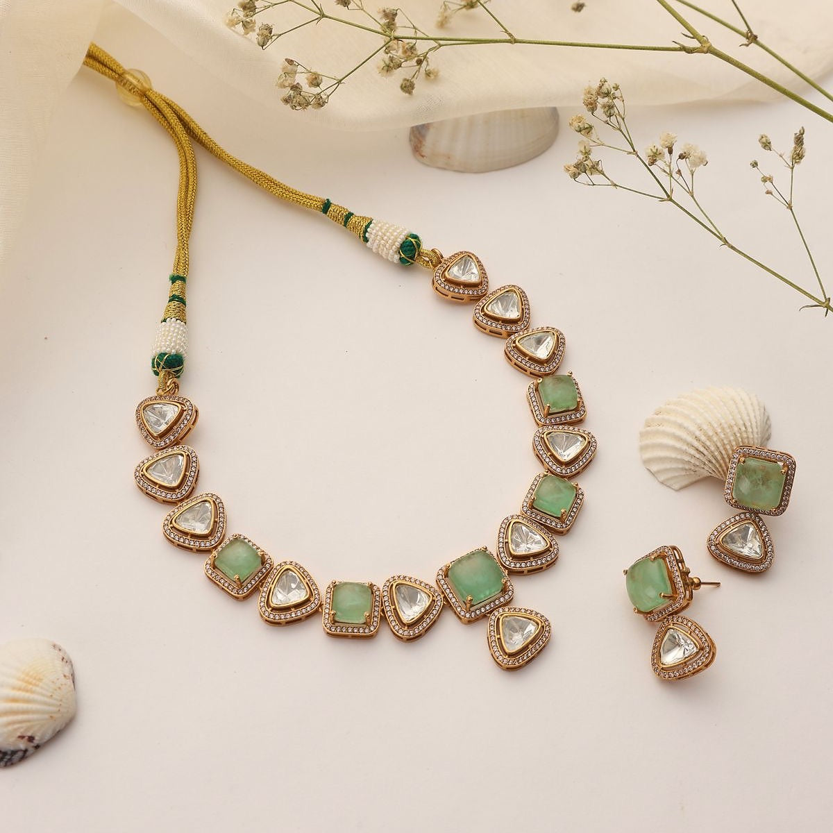 Close-up of Amaira Mint polki necklace with mint green stones