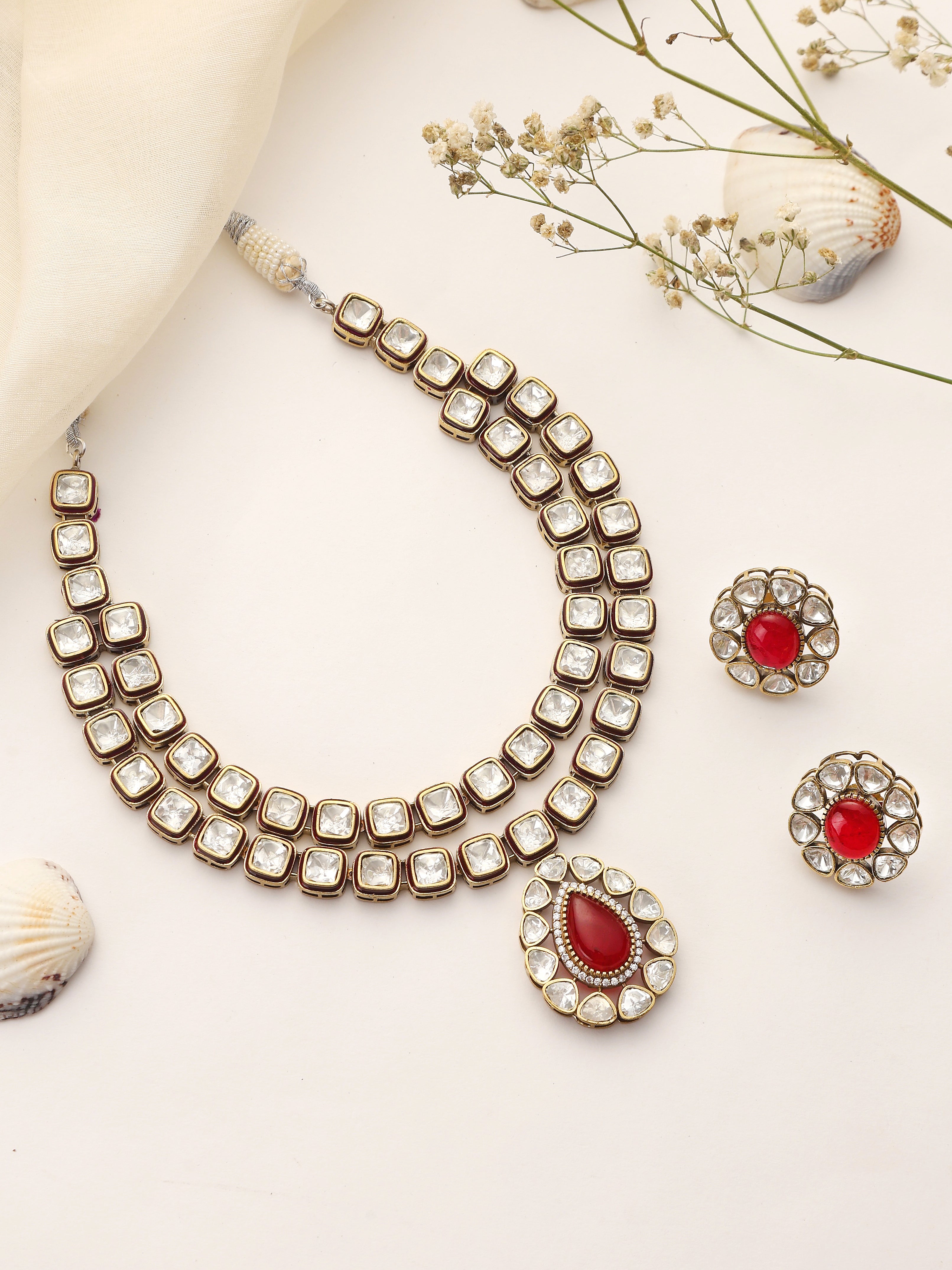 Noorika double layer Kundan necklace front view with ruby drop pendant