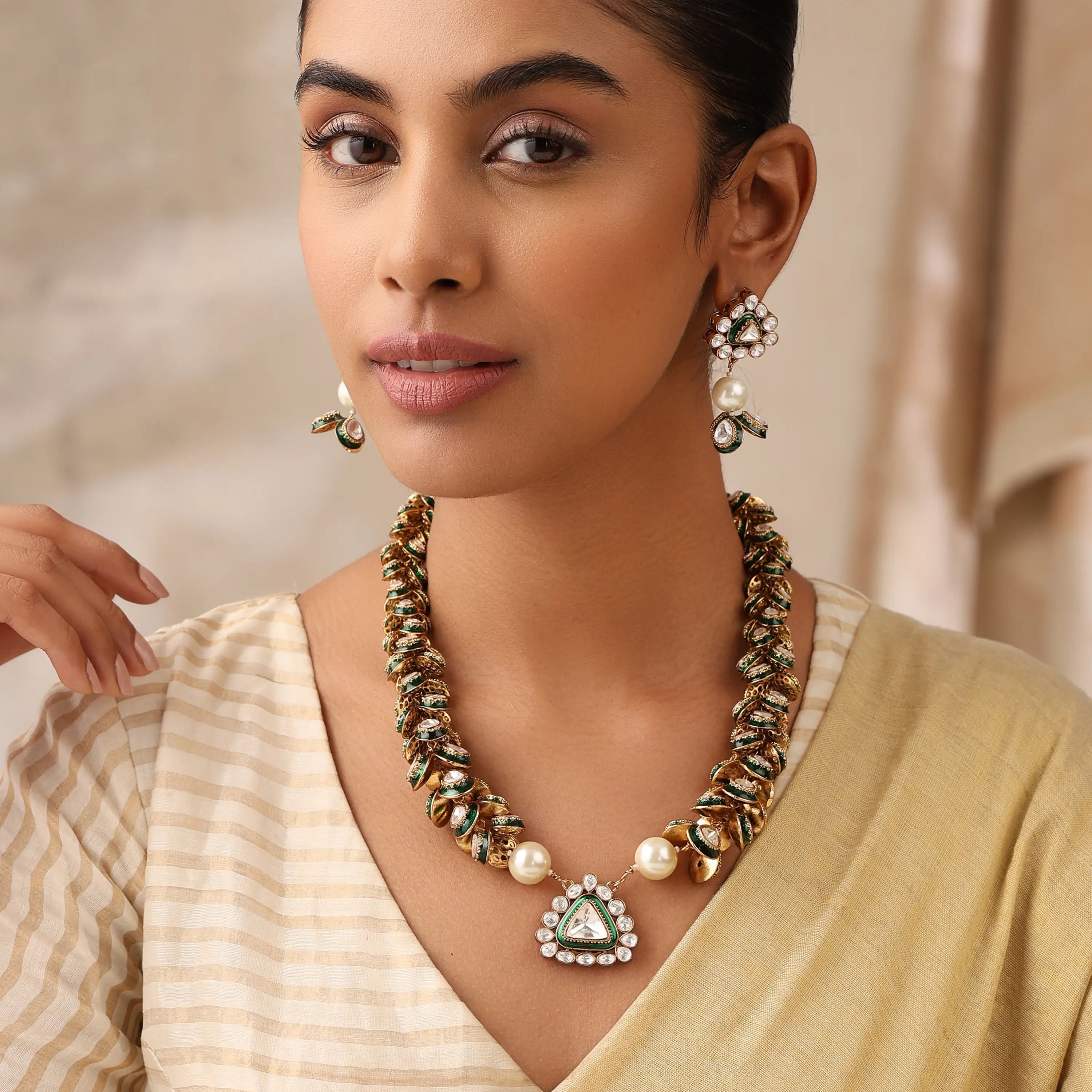 Olyra Emerald Kundan Statement Necklace Set