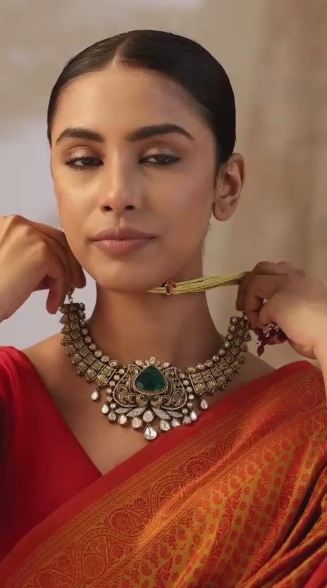 Model wearing Emerald Antique Kundan Choker Necklace with earrings