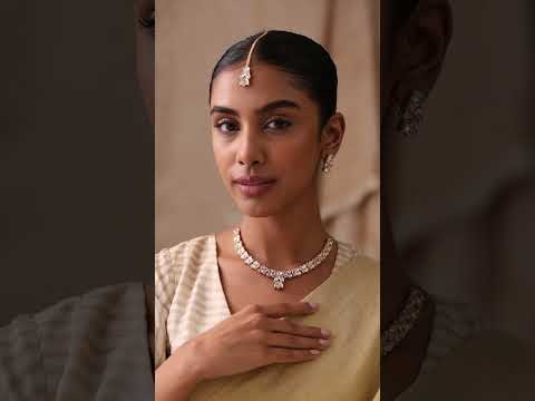 Close-up of Naina uncut polki minimal bridal necklace on model