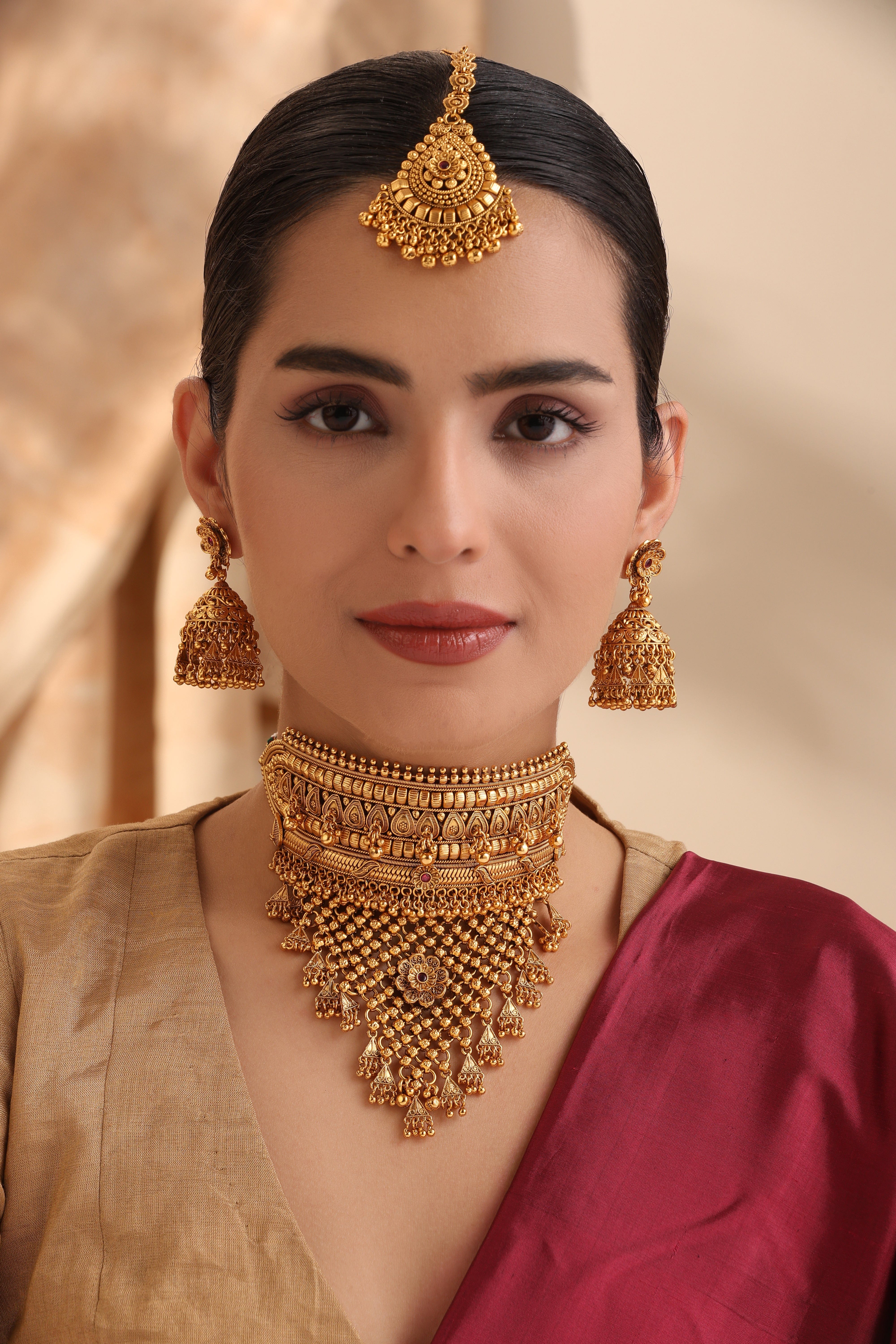 Rajasi Antique Gold Choker Set with Jhumkas