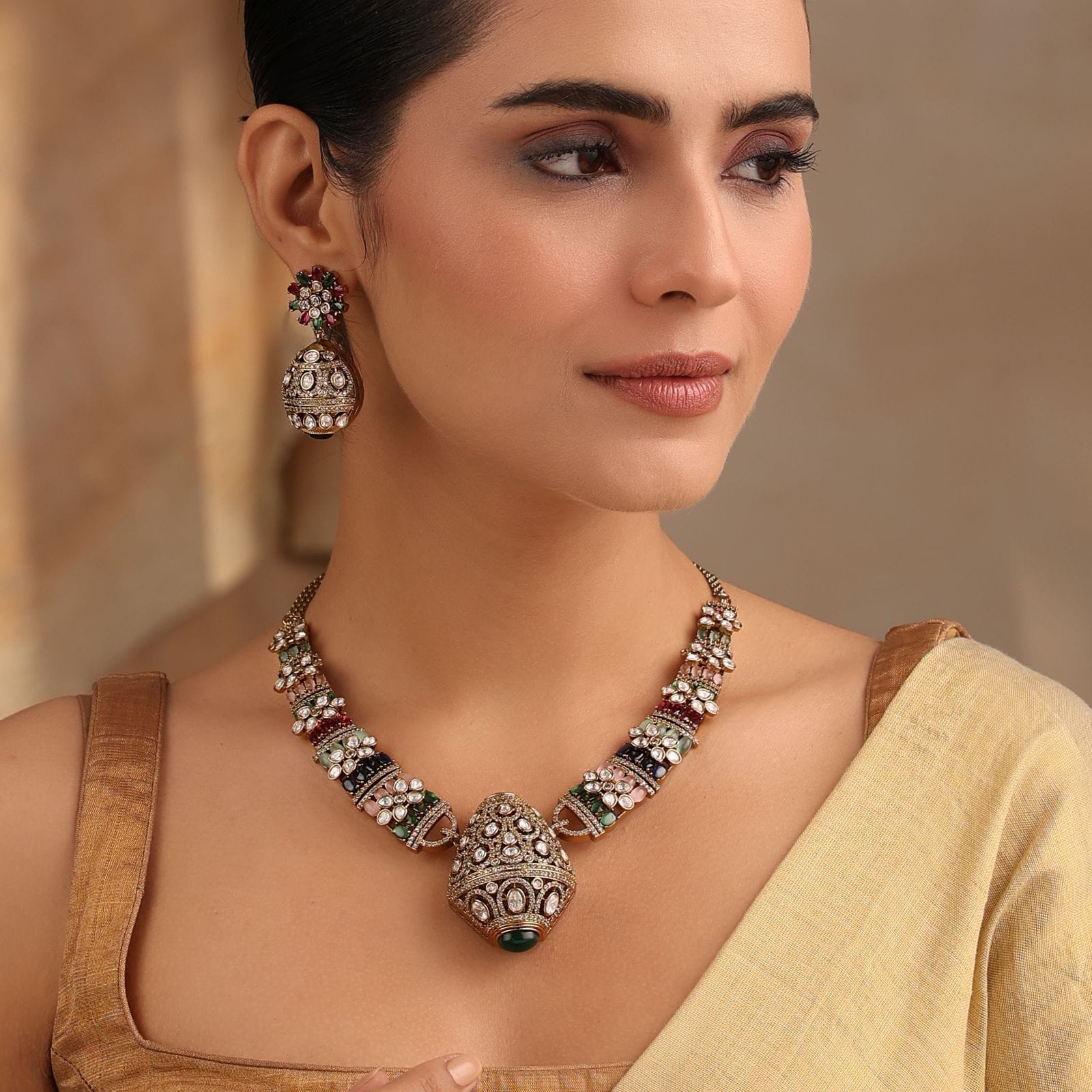 Rajvansh Navratan Multi Polki Necklace with Jhumka Earrings (Antique Gold Finish)