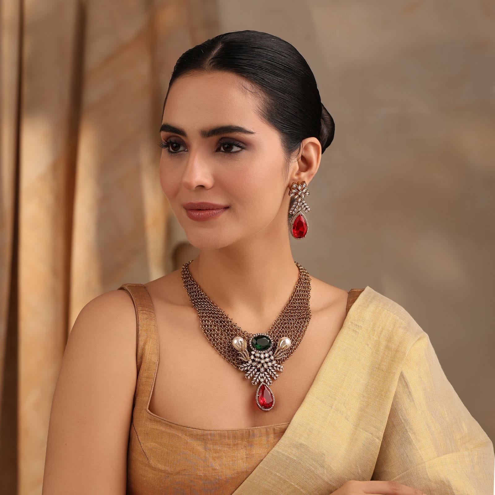 Regalia Kundan Necklace Set with Red & Green Stones