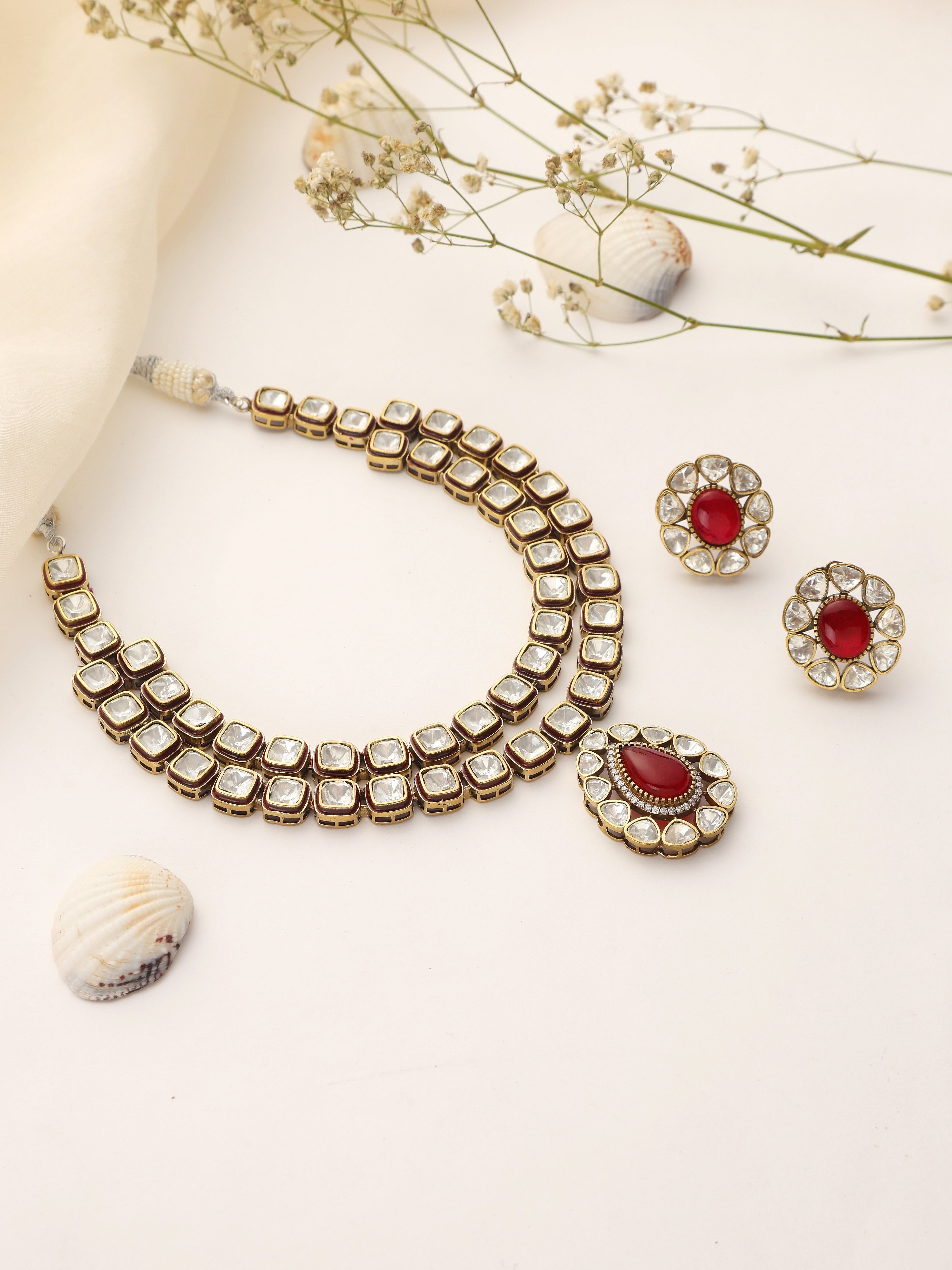 Noorika double layer Kundan necklace front view with ruby drop pendant