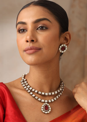 Noorika double layer Kundan necklace front view with ruby drop pendant