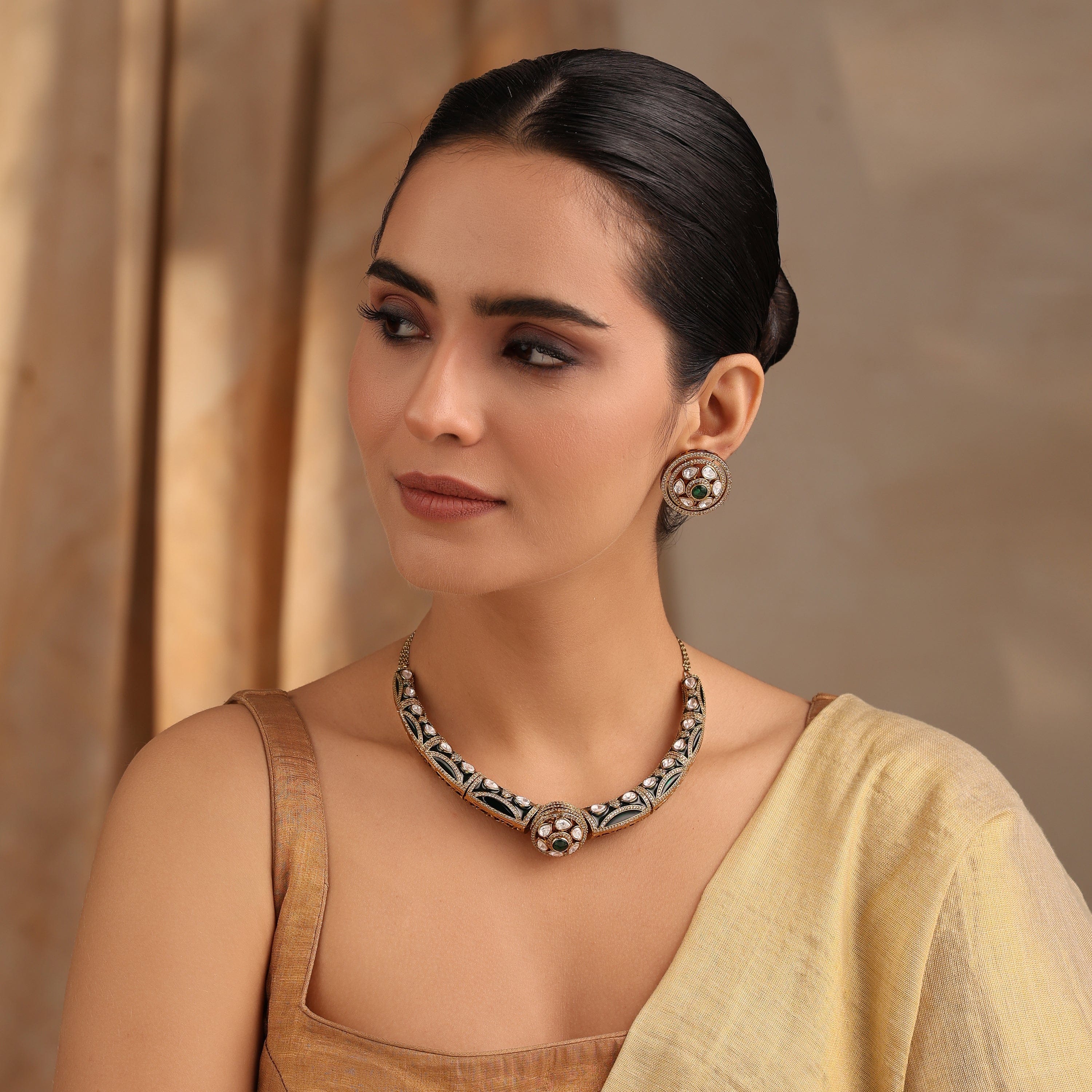 Rudra Green Kundan Hasli Set in Antique Finish with Earrings