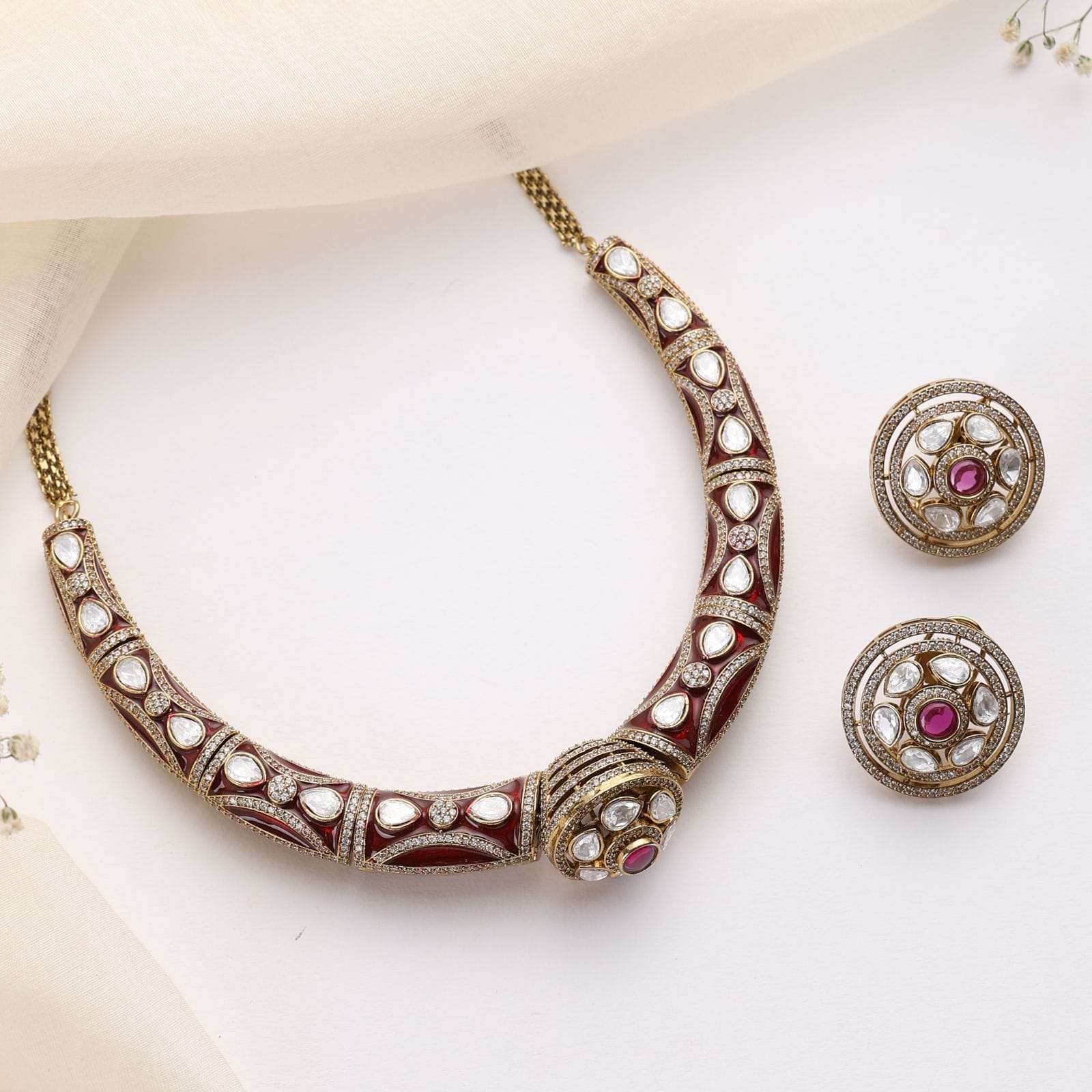 Rudra Maroon Kundan Hasli Set in Antique Finish with Earrings